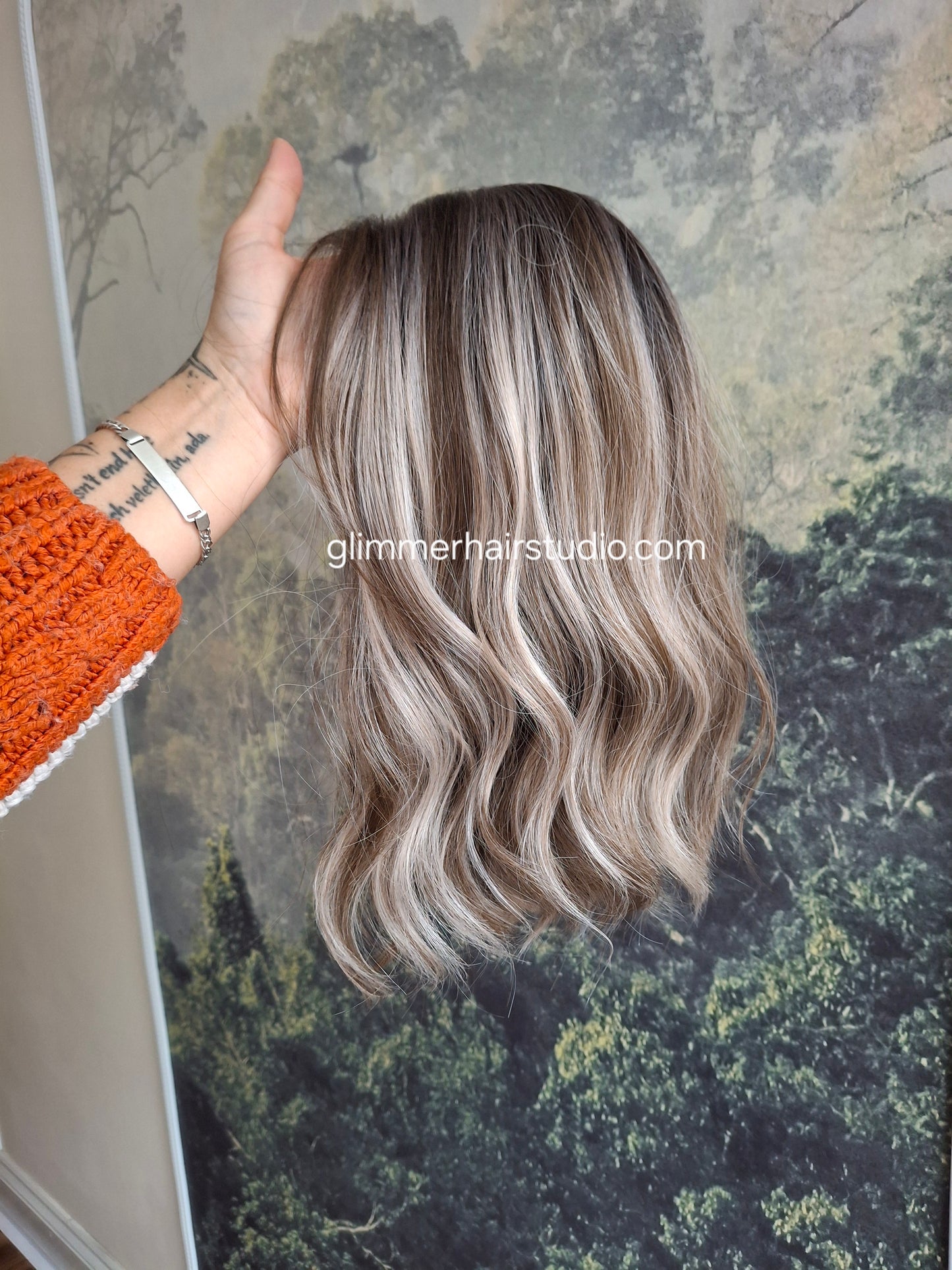 Zoe monofilament top fibre wig, wavy texture, medium adjustable cap, coffee and cream